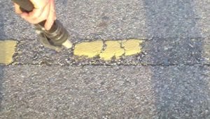 Pavement marking removal services